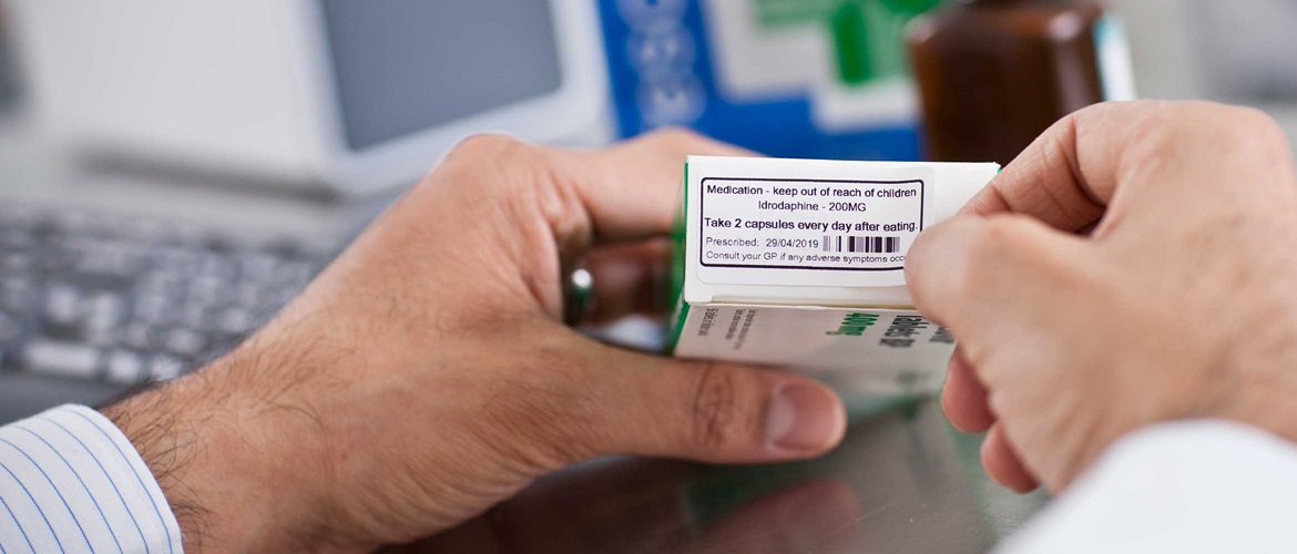Man labelling blood sample